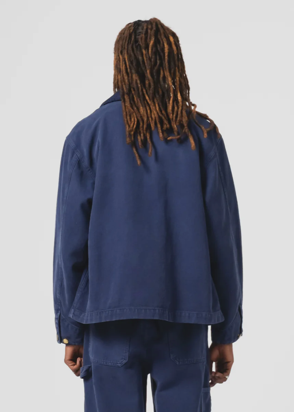 Person wearing Eat Dust Mens Canvas Arizona Jacket Indigo Blue