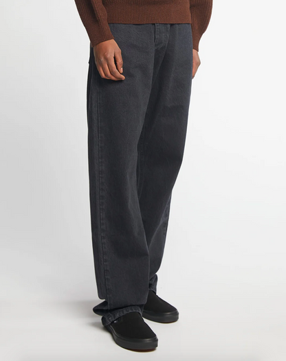 Person wearing Eat Dust Mens D66 Baggy Skate Pant Faded Black
