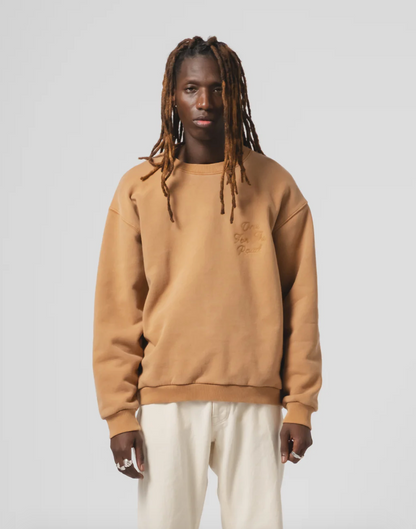 Person wearing Eat Dust Mens Unisex Detroit Sweater in Sugar