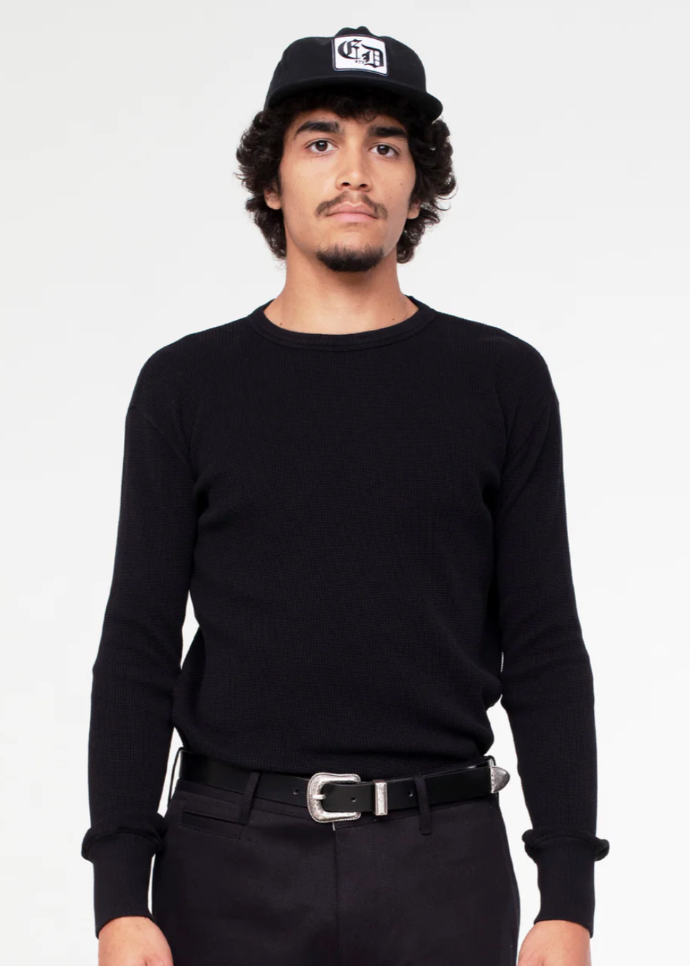 Person wearing Eat Dust Mens Waffle Jersey Long Sleeve Tee Black