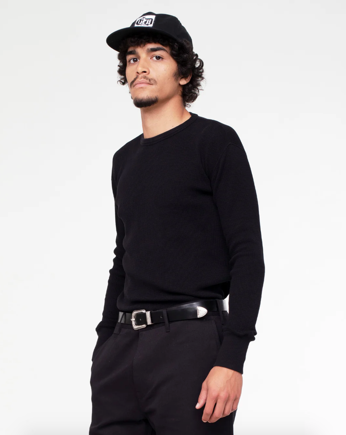 Person wearing Eat Dust Mens Waffle Jersey Long Sleeve Tee Black