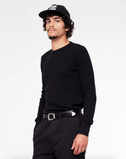 Person wearing Eat Dust Mens Waffle Jersey Long Sleeve Tee Black