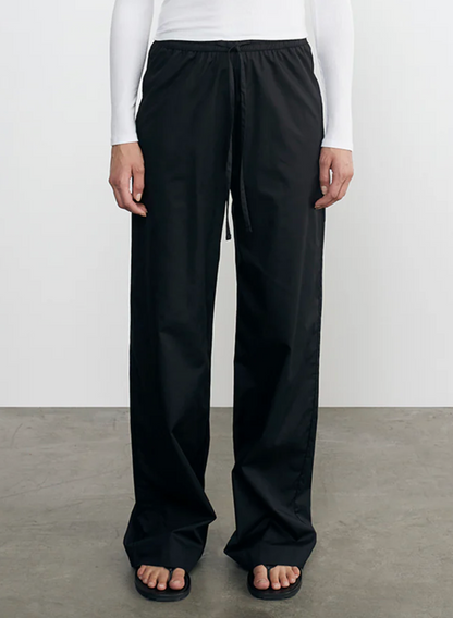 Person wearing Enza Costa Cotton Resort Pant in Black