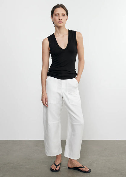 Person wearing Enza Costa Twill Work Pant in Off White