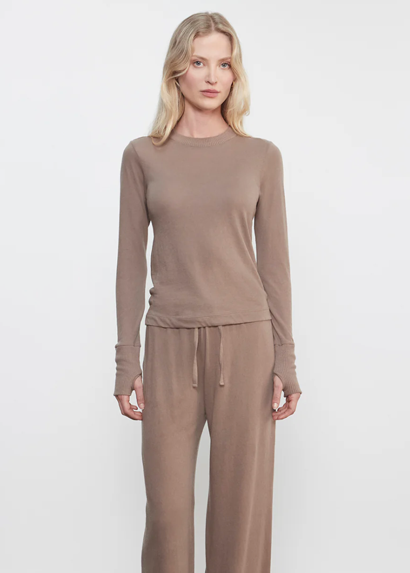  Person wearing Enza Costa womens Cashmere Easy Cuffed Crew in Walnut