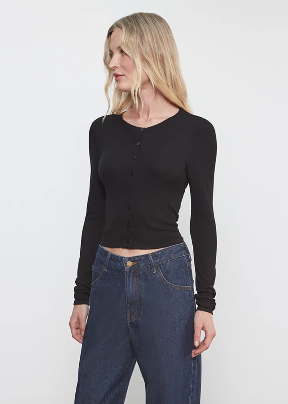 person wearing Enza Costa womens Silk Rib Essential Cardigan in Black