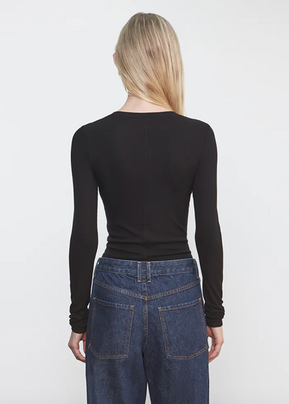 person wearing Enza Costa womens Silk Rib Essential Cardigan in Black