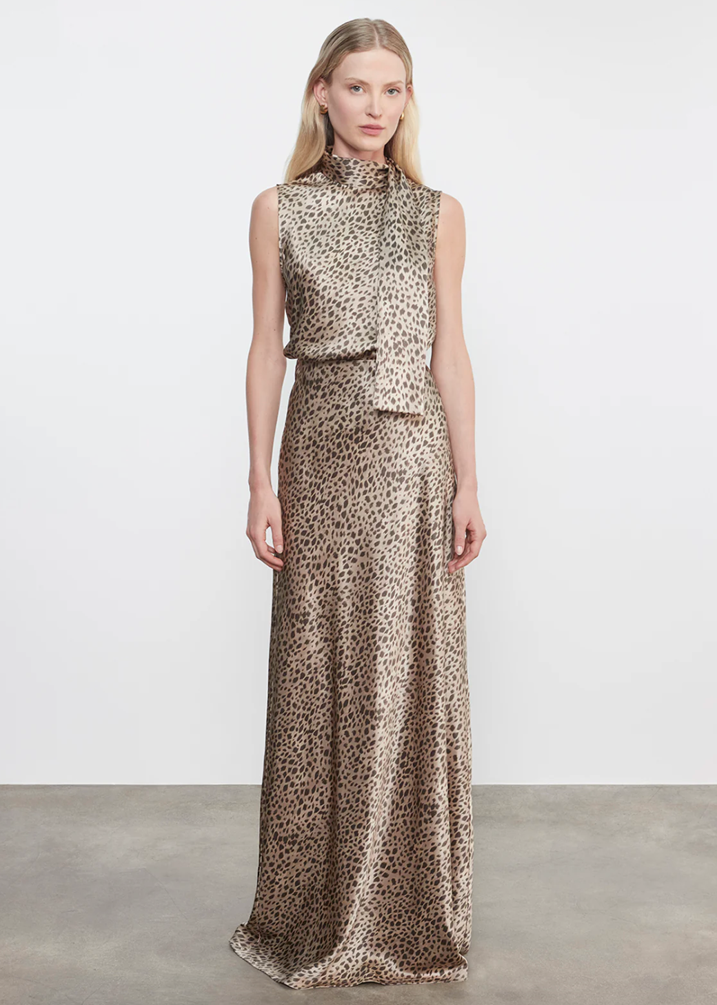Person wearing Enza Costa womens Silk Satin Full Length Skirt in Cheetah Print
