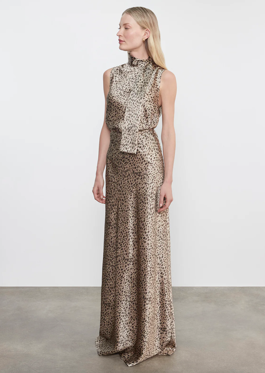 Person wearing Enza Costa womens Silk Satin Full Length Skirt in Cheetah Print