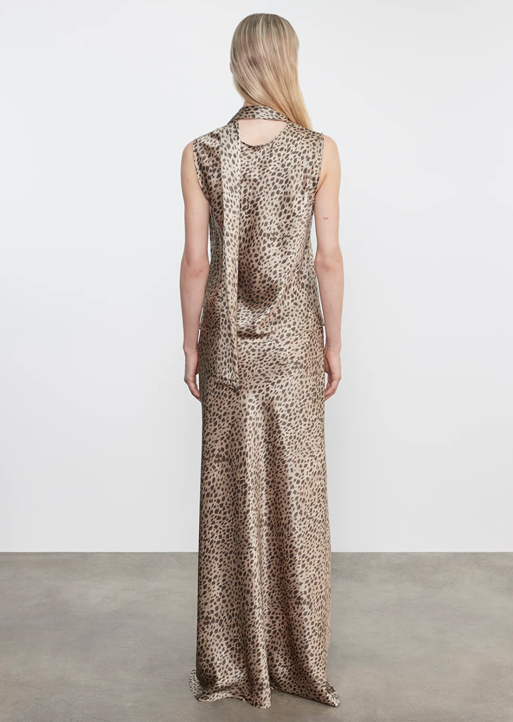 Person wearing Enza Costa womens Silk Satin Full Length Skirt in Cheetah Print