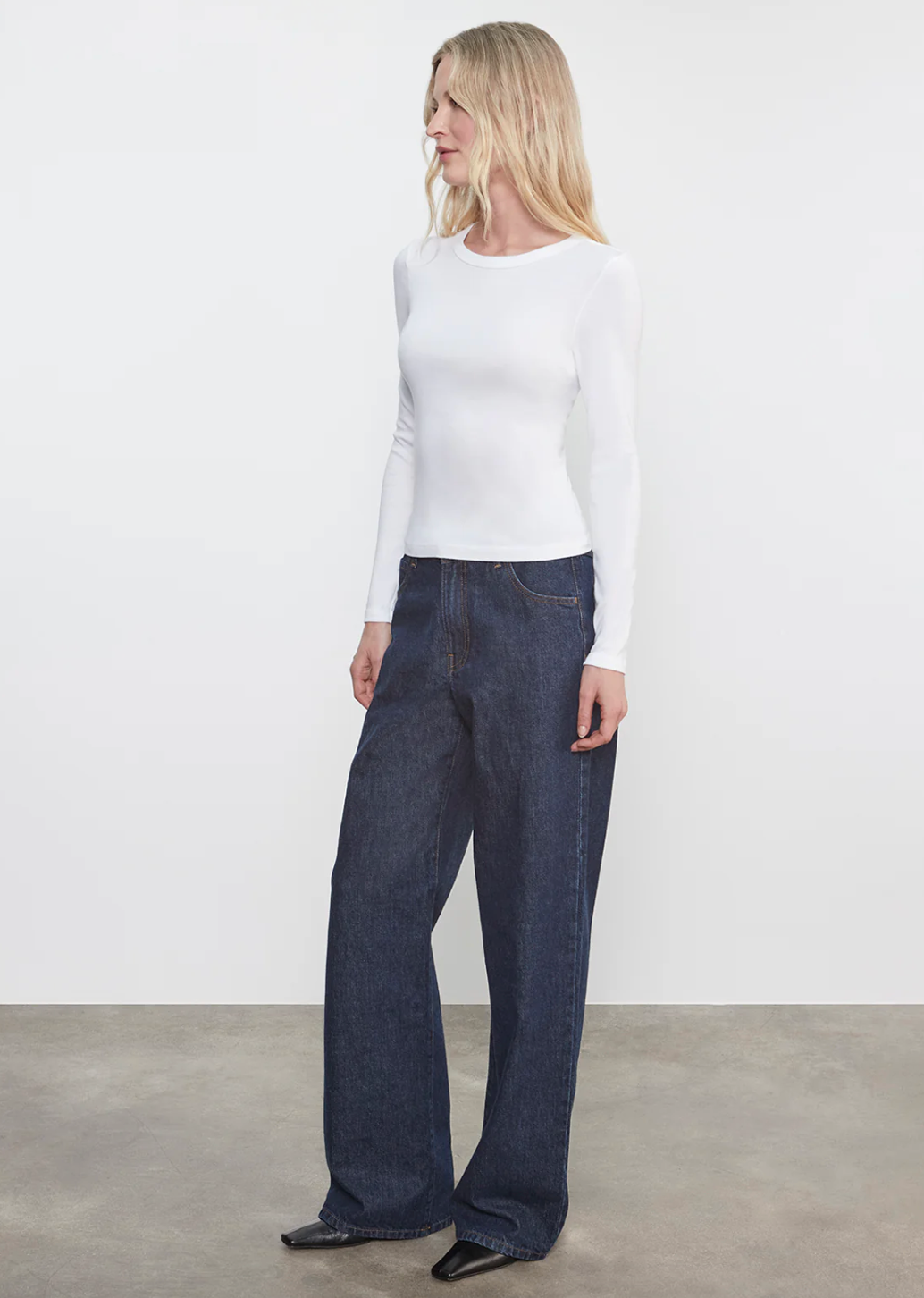 Person wearing Enza Costa womens Supima Cotton Long Sleeve Tee in White