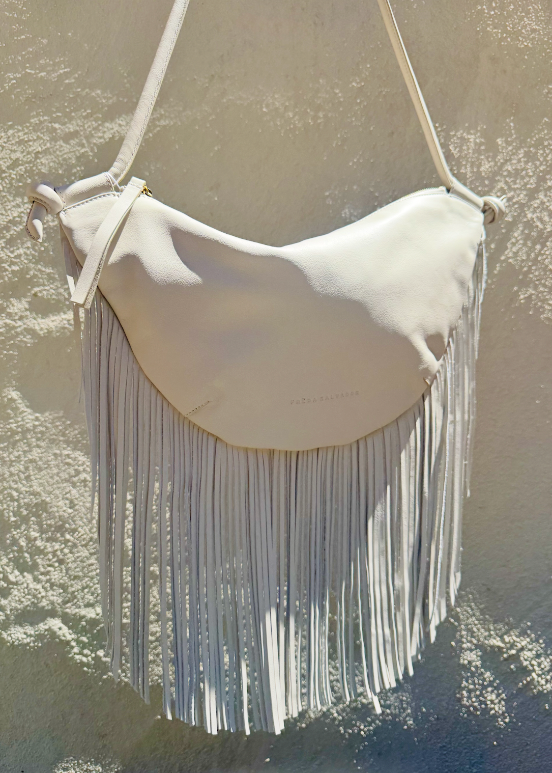 FREDA SALVADOR womens Erika Crescent Fringe Bag in Bone