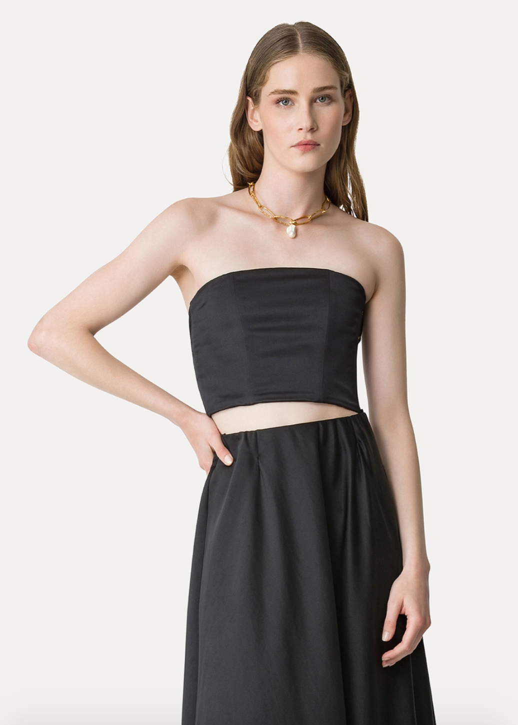Person wearing Forte Forte Duchesse Satin Bustier Top in Black