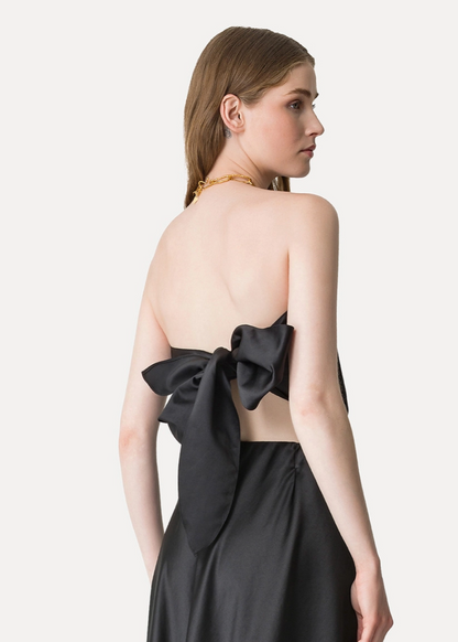 Person wearing Forte Forte Duchesse Satin Bustier Top in Black