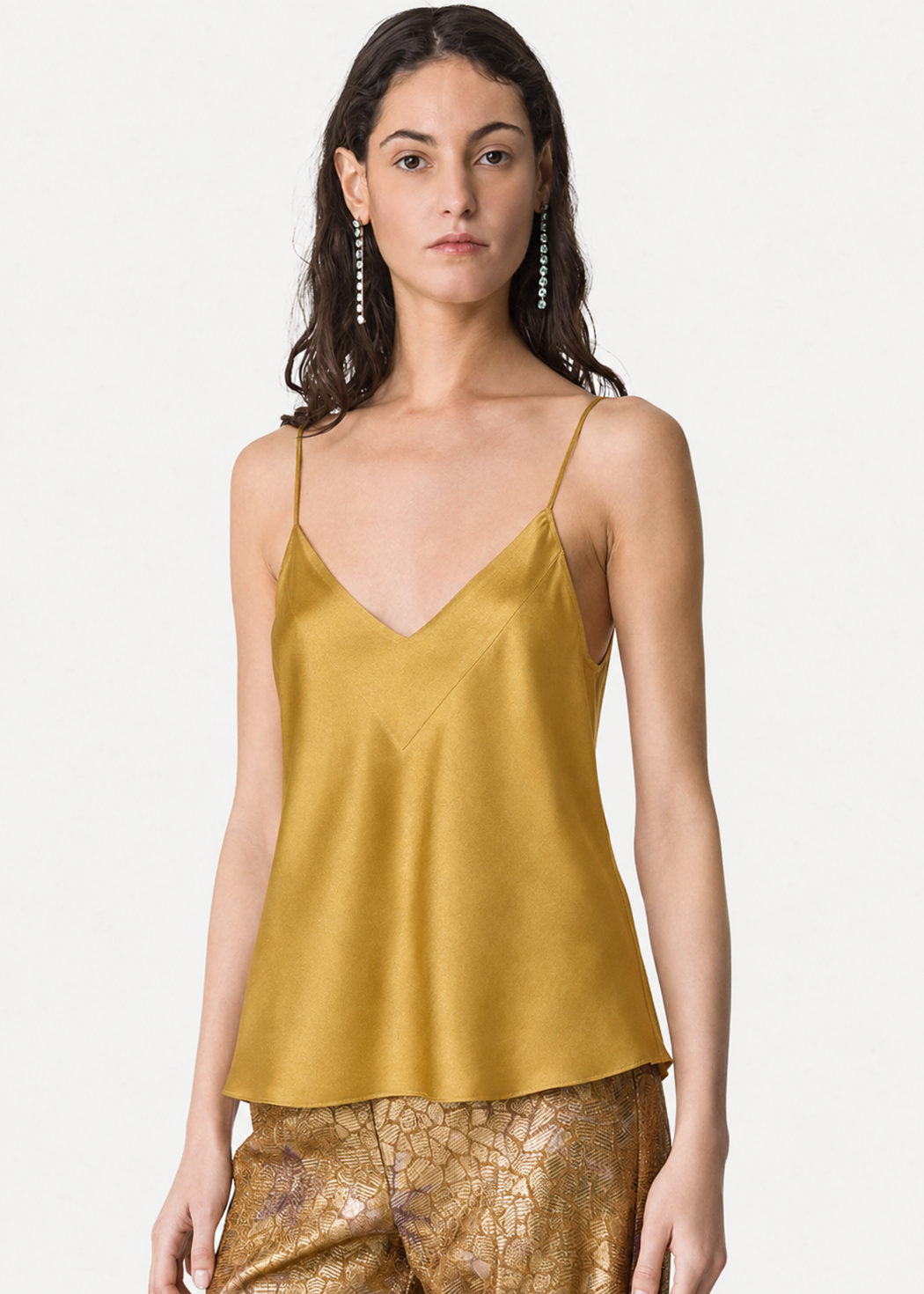 Person wearing Forte forte womens envers Satin Camisole in Saffron