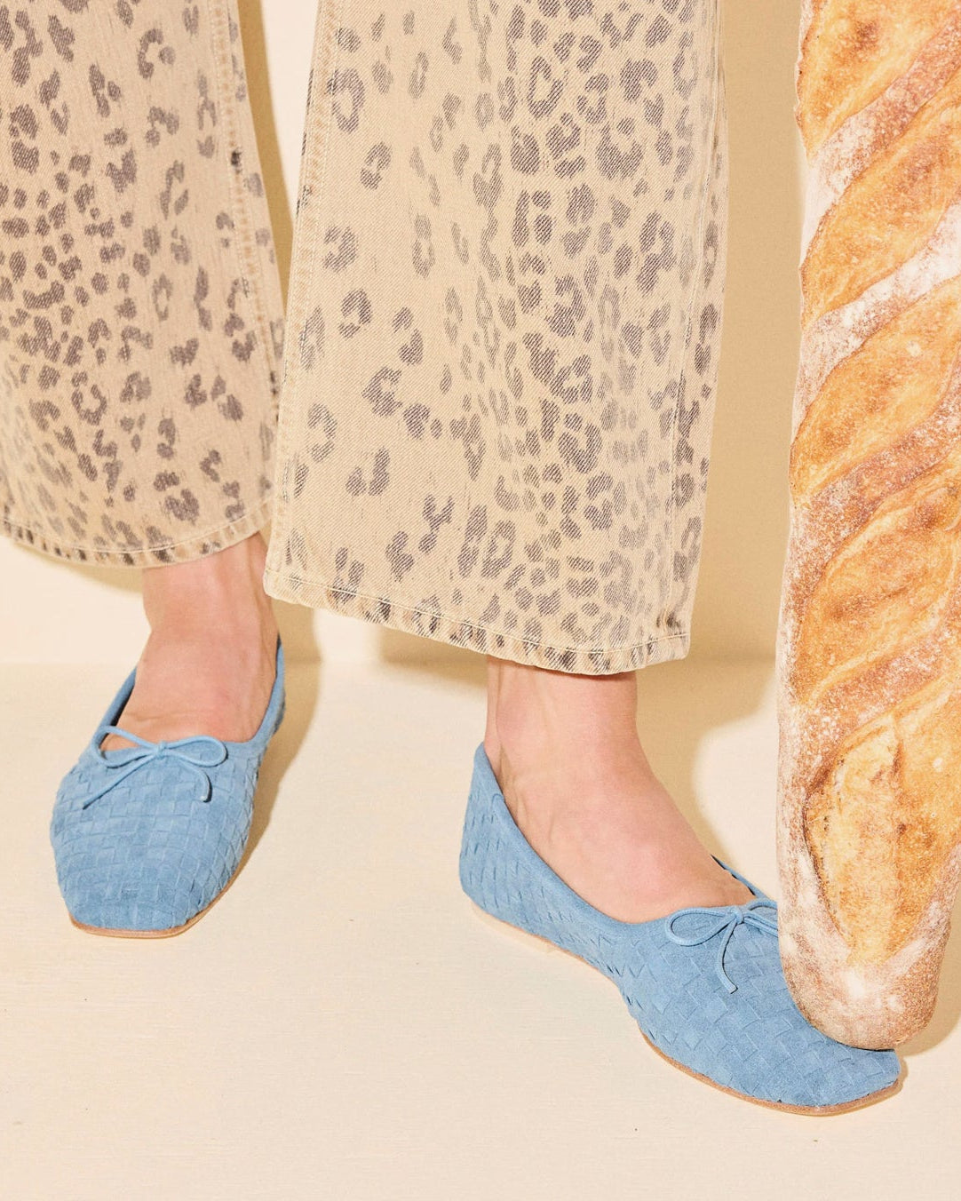 Person wearing Freda Salvador Jada Woven Ballet Flat in Denim Suede
