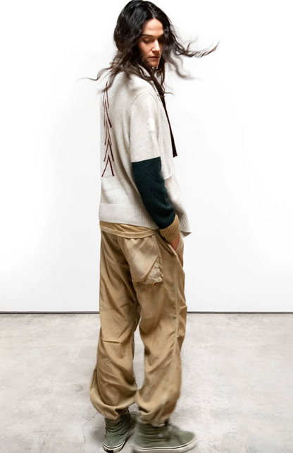 Person wearing Freecity Flap/Snap Satin Airjump Pants Golden Dirt
