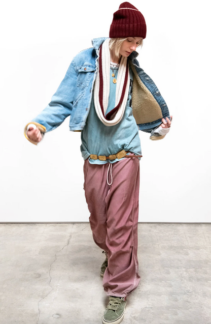 Person wearing Freecity Matte Satin Drawcord Biggy Pants in Blush Powder