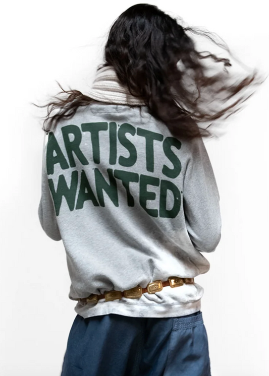 Person wearing Freecity unisex Artists Wanted Bleachout Raglan Sweatshirt