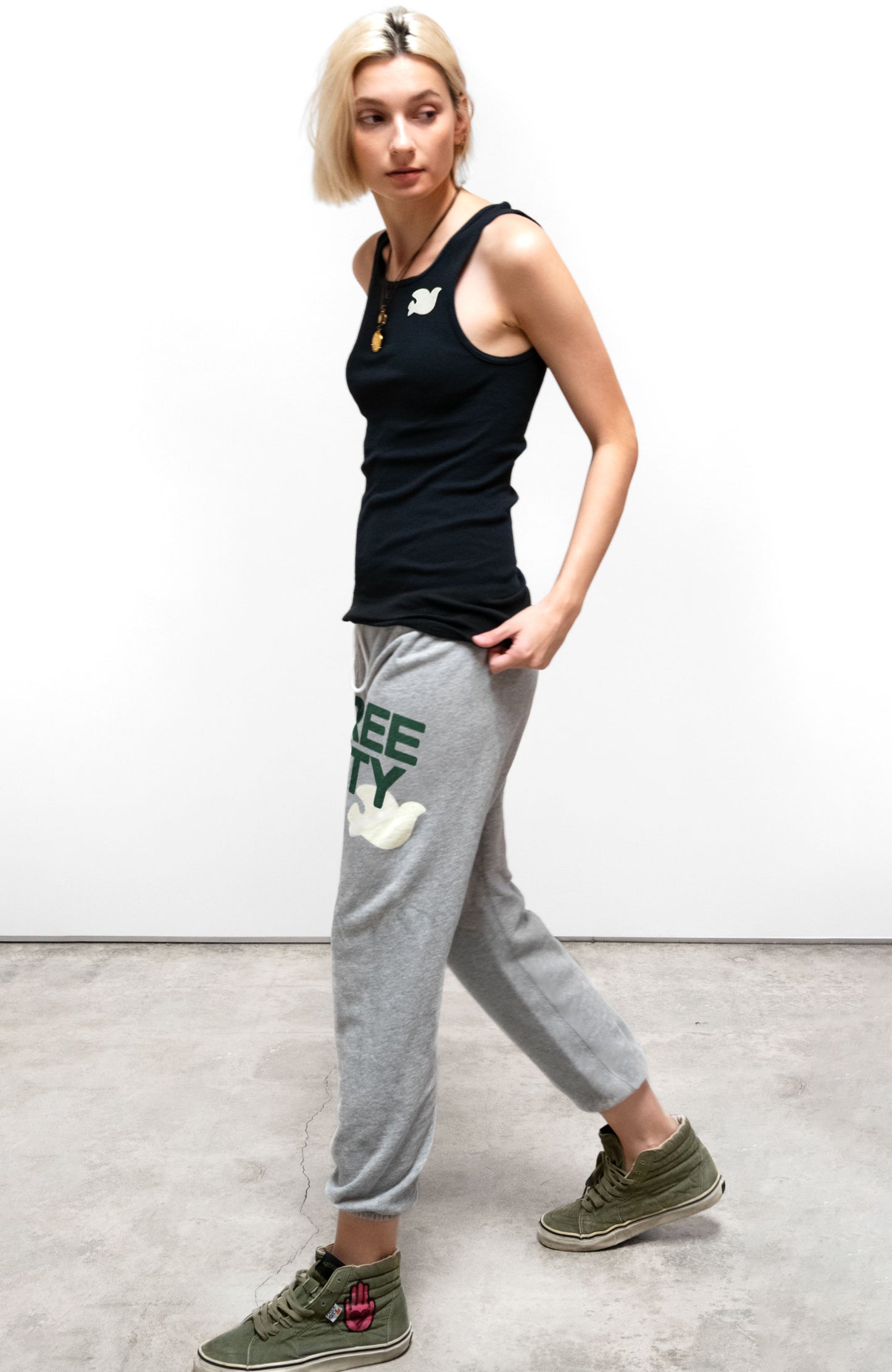 Person wearing Freecity unisex Flow Sweatpant in Heather
