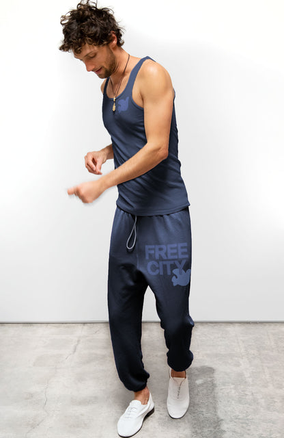 Person wearing Freecity unisex Flow Sweatpant in Moonshrooms Blue