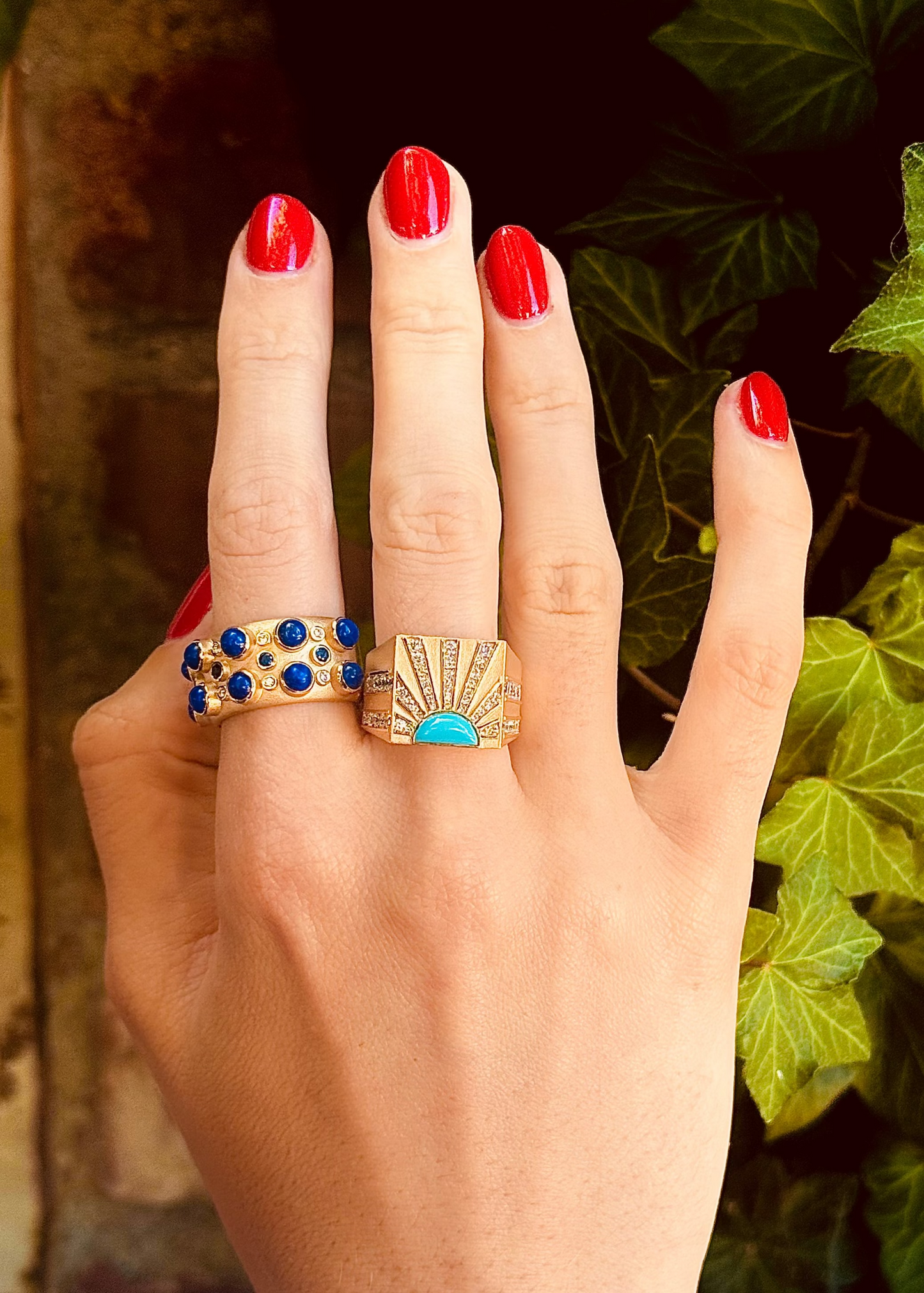 Person wearing Grace Winfrey fine jewelry 18k gold Trio Stone Cabochon Ring with Lapis