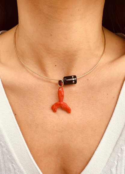 person wearing Hand Carved Coral Fish Charm with Citrine and Coral Bead with Diamonds