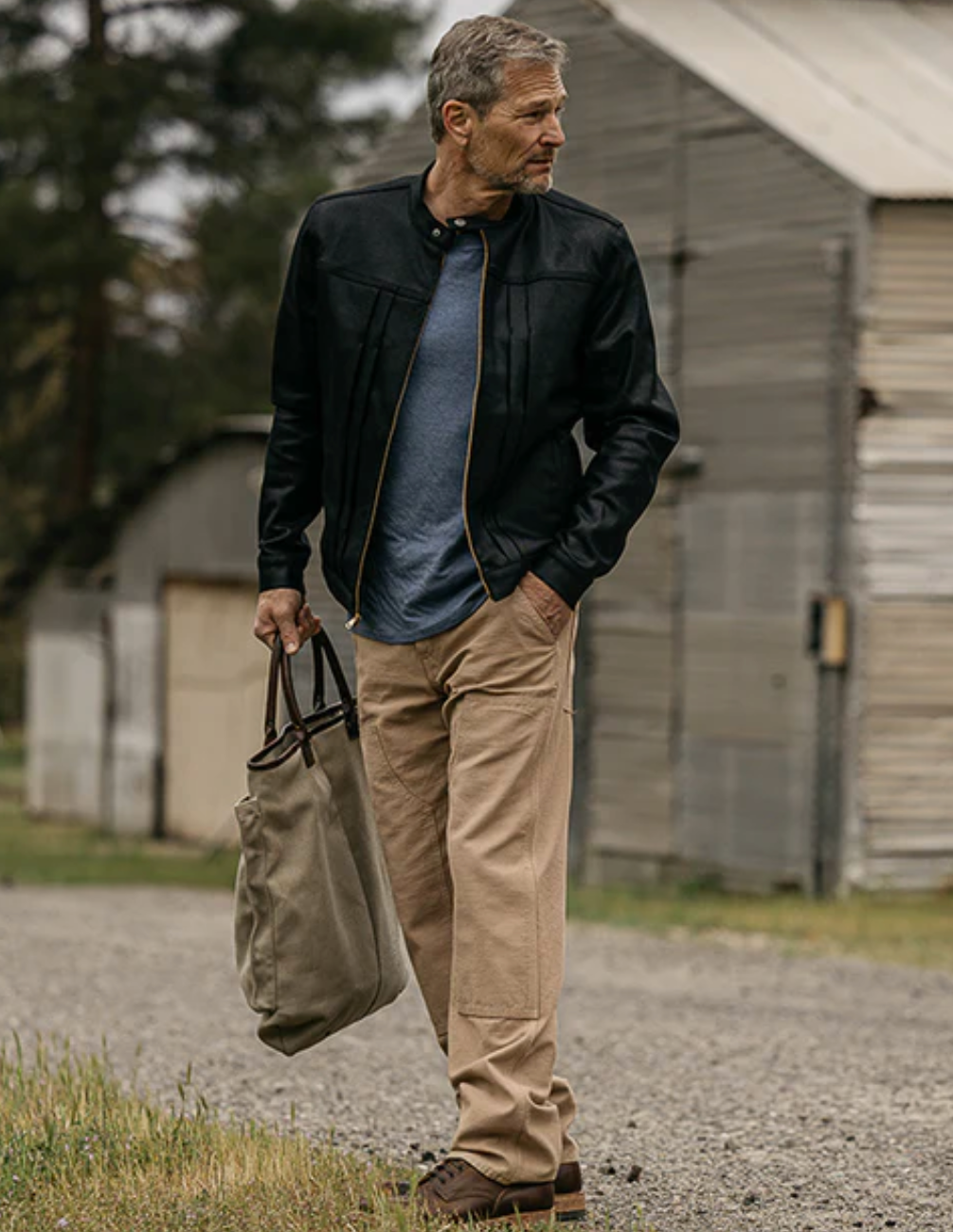 Person wearing Hiroshi Kato mens The Double Knee Pants Classic Straight in Sawdust