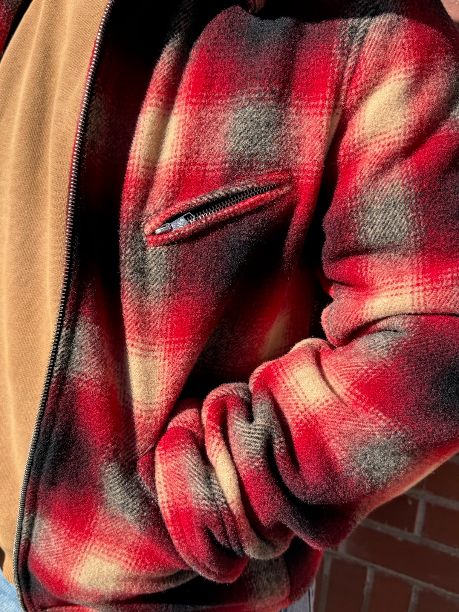 Person wearing Hollywood Forever Records mens wool Plaid Hunter Jacket