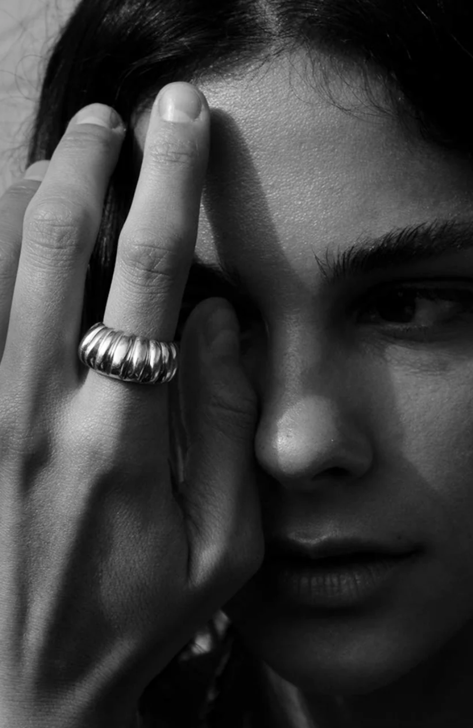 Person wearing Howl fine jewelry 18k yellow gold Bombshell Ring with Rubies