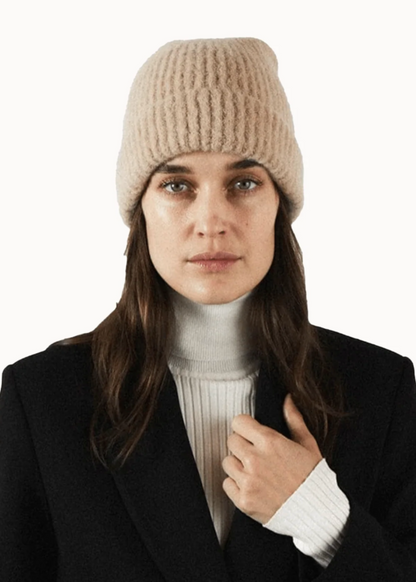 Person wearing Janessa Leone The Piper Beanie in Oatmeal Wool