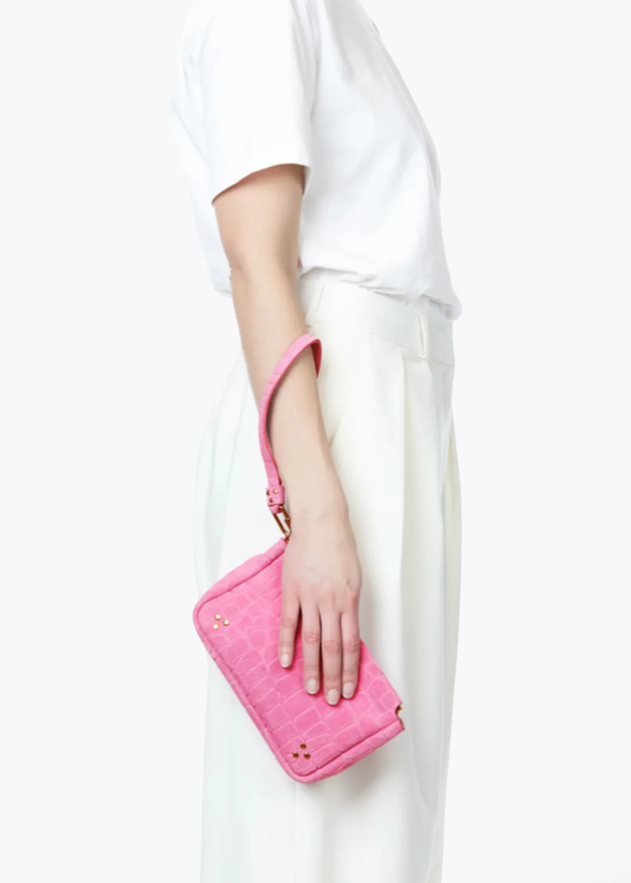 Person carrying Jerome Dreyfuss Clap Clutch Large in Pink Croco Suede