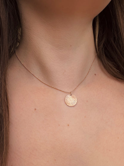 Person wearing Julez Bryant fine jewelry 14k rose gold Sage Small Pendant with Diamonds on Diamond Cut Ball Chain