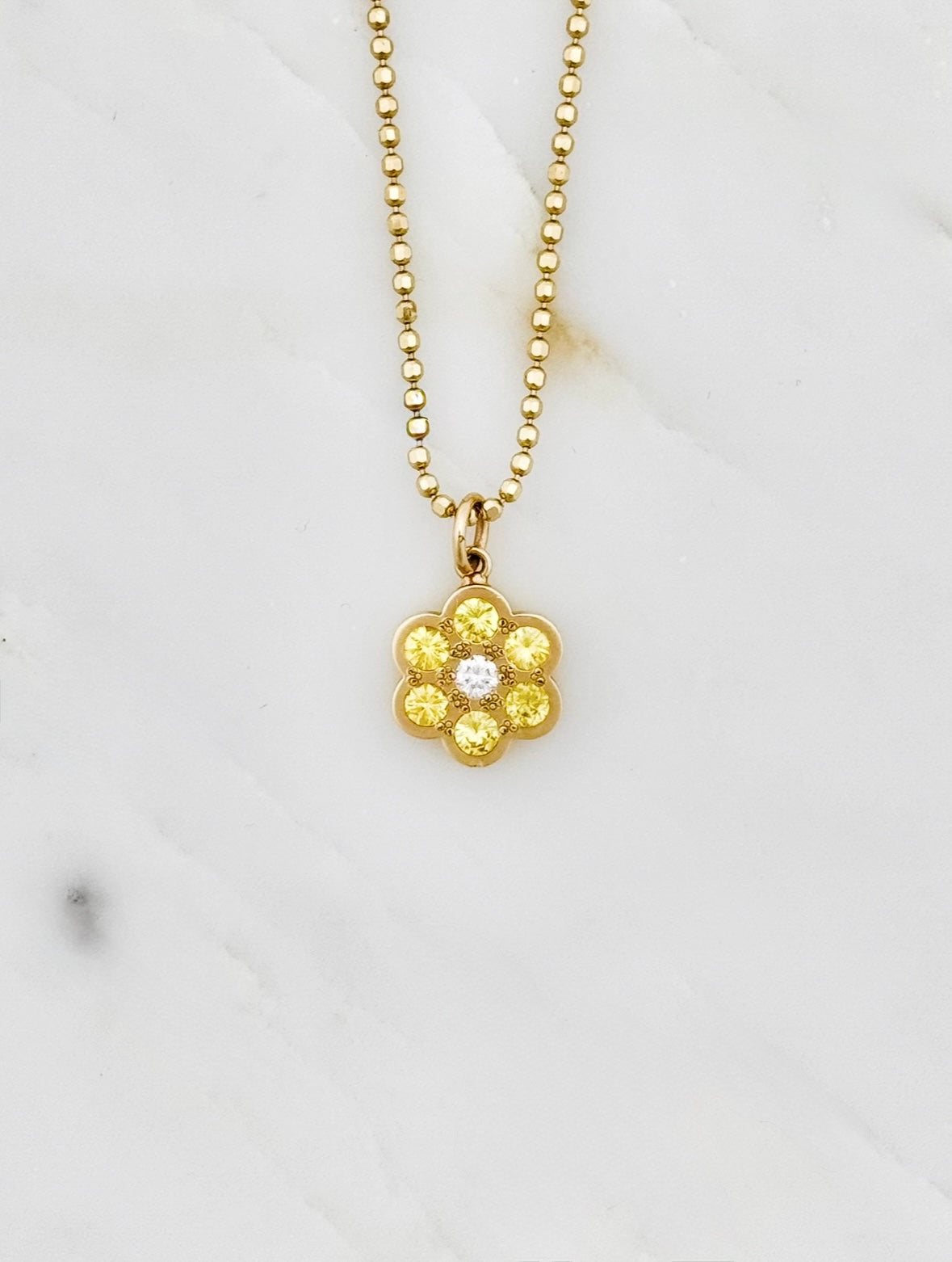 Julez Bryant fine jewelry 14k yellow gold Genu Flower Pendant with Sapphires