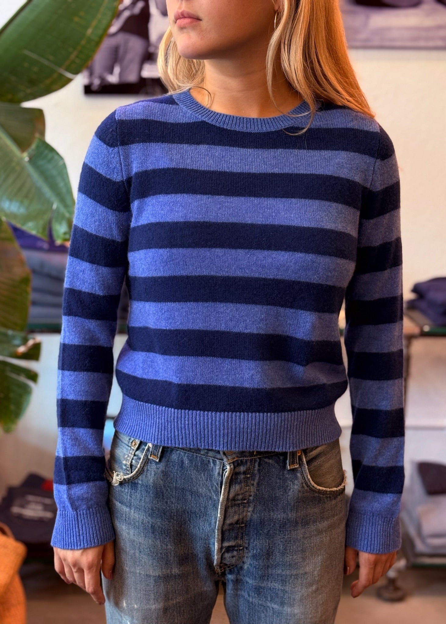 Person wearing Jumper 1234 womens Cashmere Stripe Crew Sweater in Periwinkle and Denim