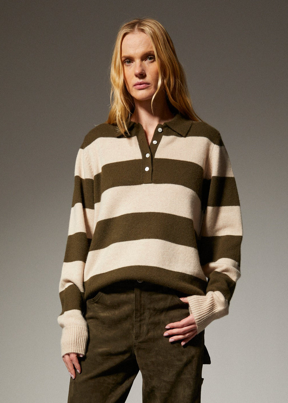 person wearing sprwmn Cashmere Polo Sweater in Olive Stripe