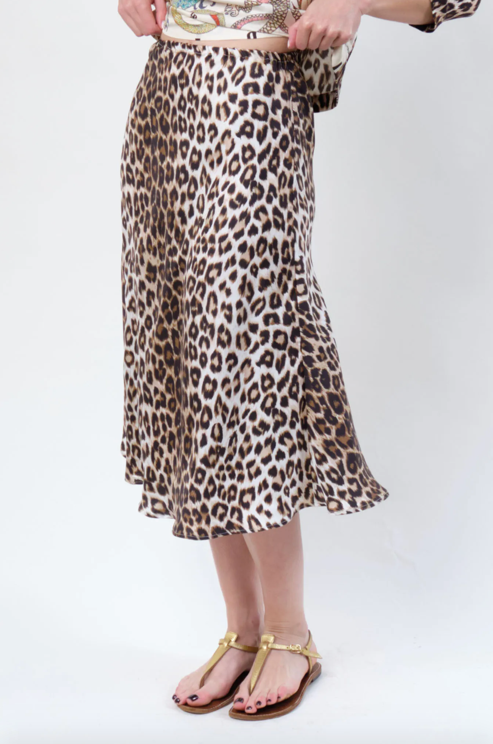 Person wearing La Prestic Ouiston womens Silk Twill Nola Panther Midi Skirt