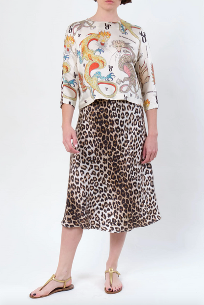Person wearing La Prestic Ouiston womens Silk Twill Nola Panther Midi Skirt