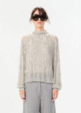 Person wearing Maria Cher Lagui Lark Sequin Shirt in Silver