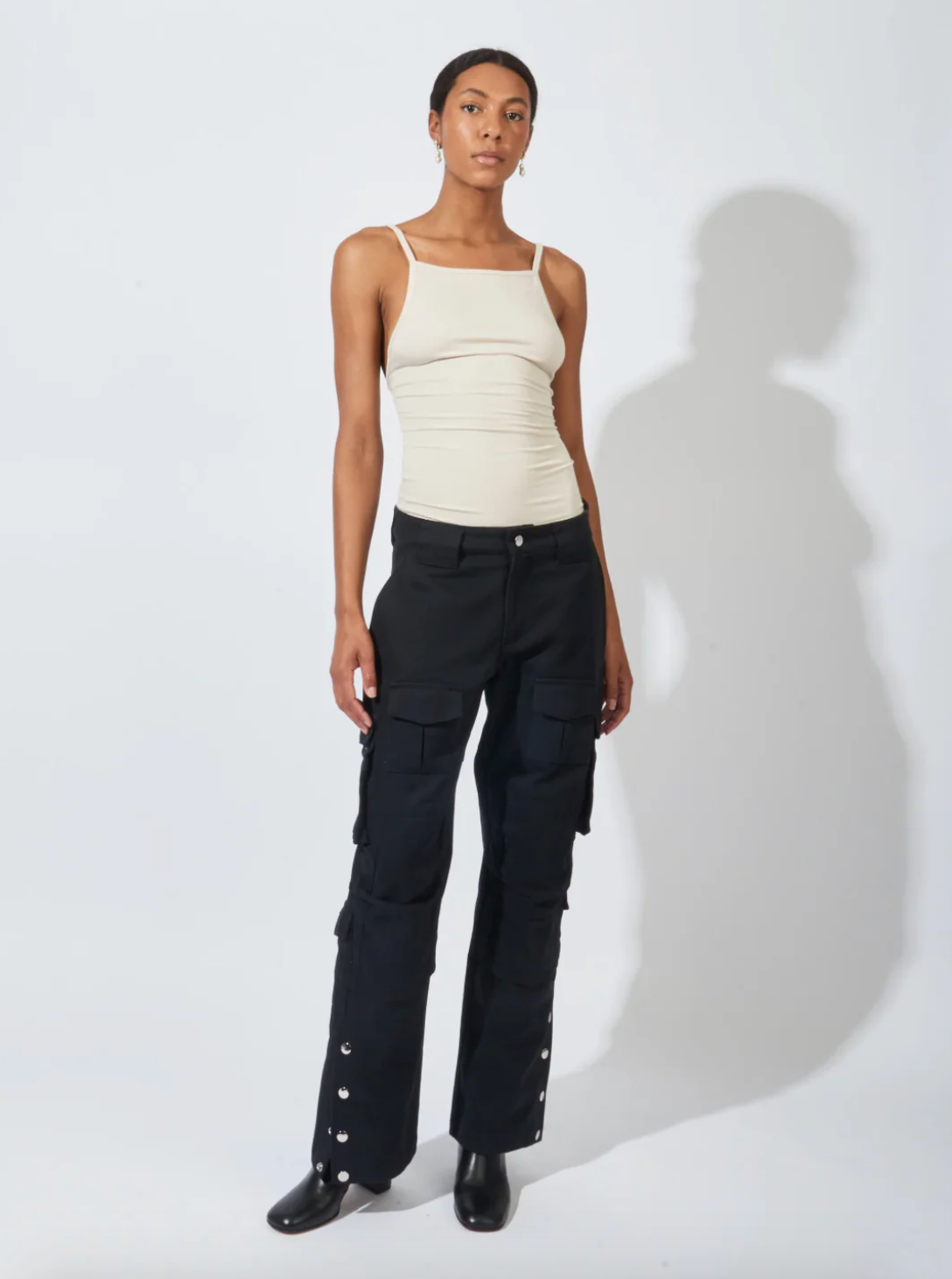 Person wearing Nia Thomas Othella Tank in Sand