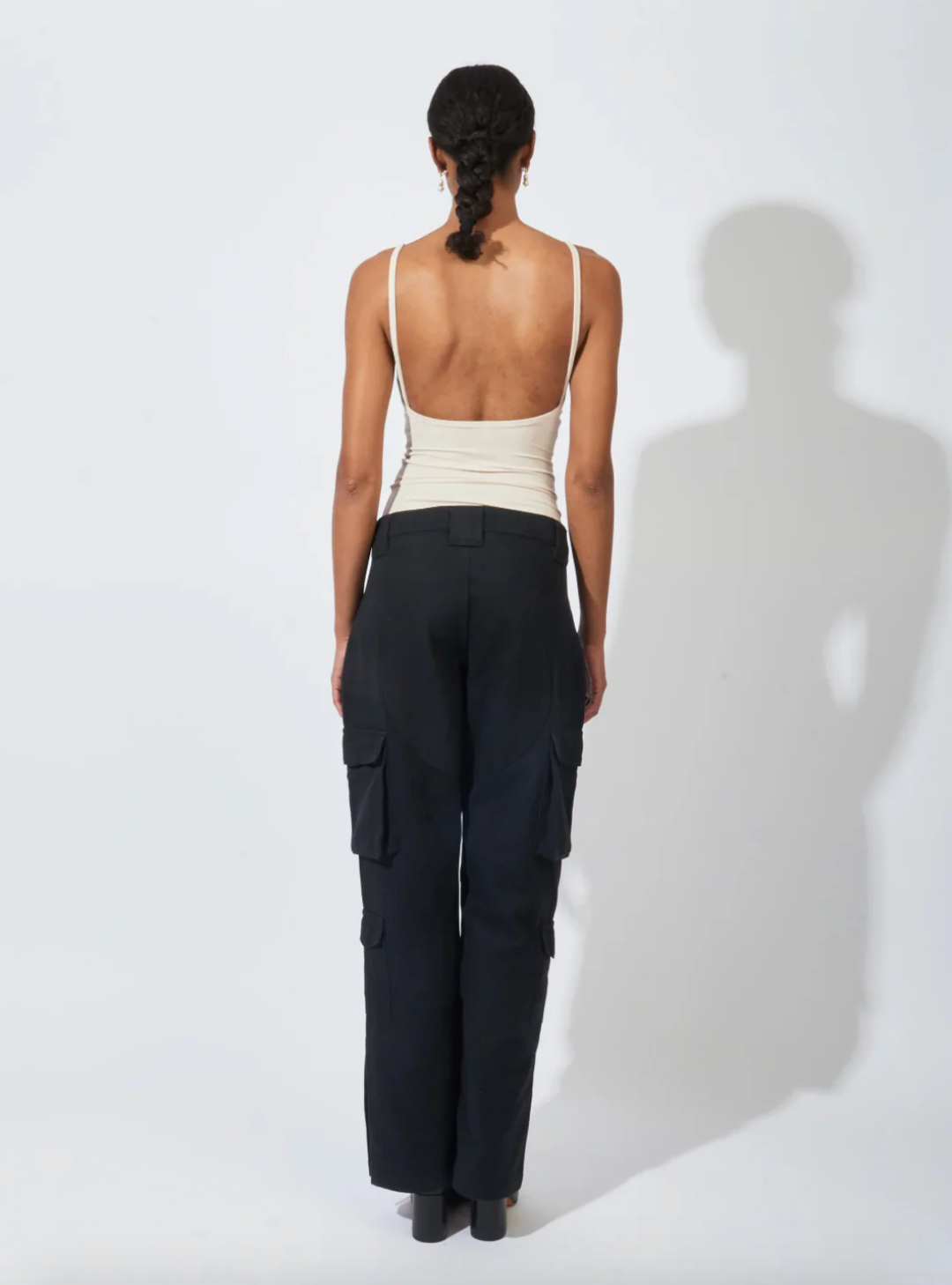 Person wearing Nia Thomas Othella Tank in Sand