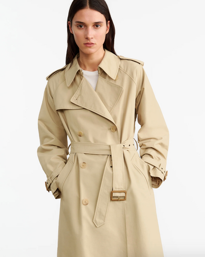 Person wearing Nili Lotan Cotton Nylon Tanner Trench Coat in Khaki