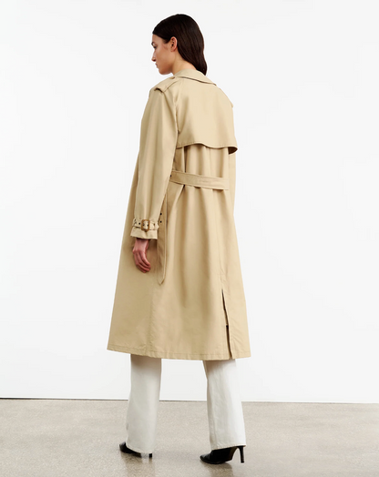 Person wearing Nili Lotan Cotton Nylon Tanner Trench Coat in Khaki