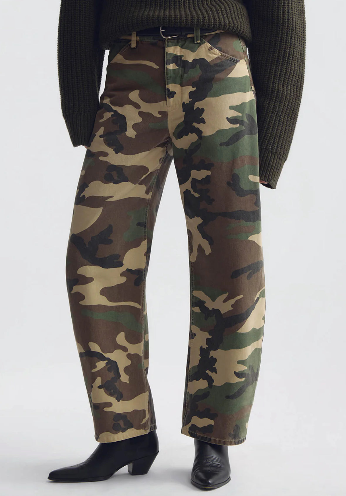 Person wearing Nili Lotan womens Tribeca Cotton Pant in khaki overdyed camo