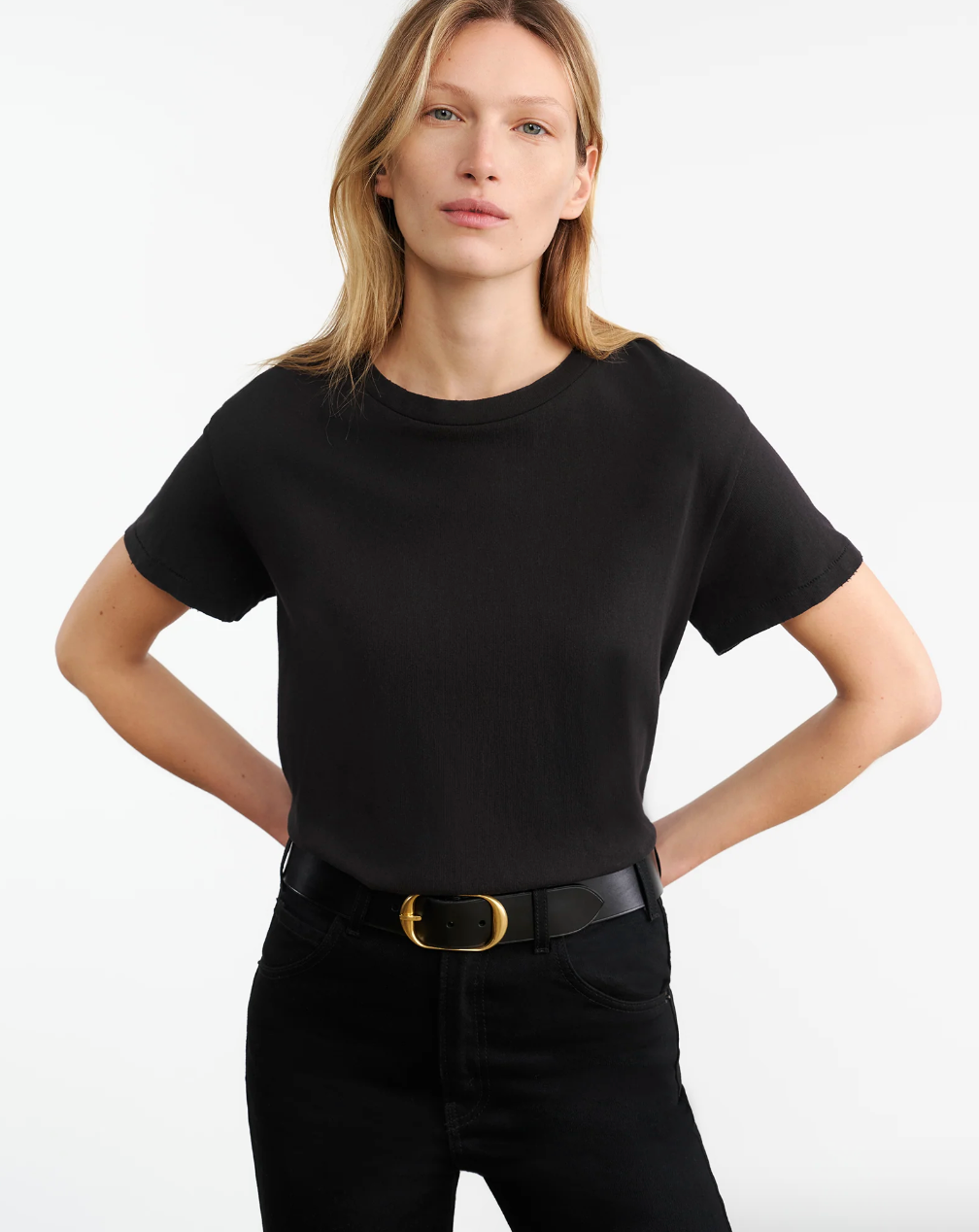 Person wearing Nili Lotan womens cotton Brady Tee in Black