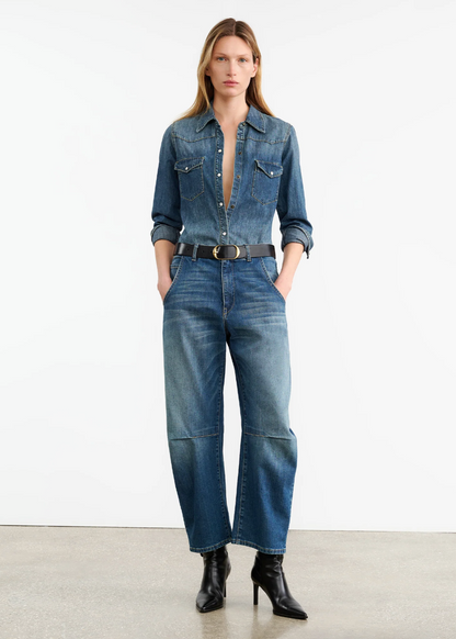 Person wearing Nili Lotan womens denim Emerson Jean in Classic Wash