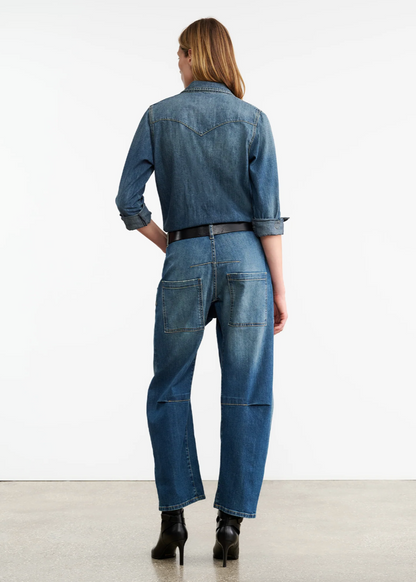 Person wearing Nili Lotan womens denim Emerson Jean in Classic Wash