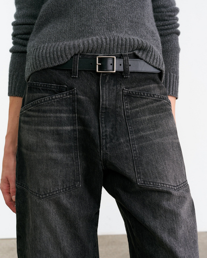 Person wearing Nili Lotan womens denim Shon Jean in Stone Black Wash