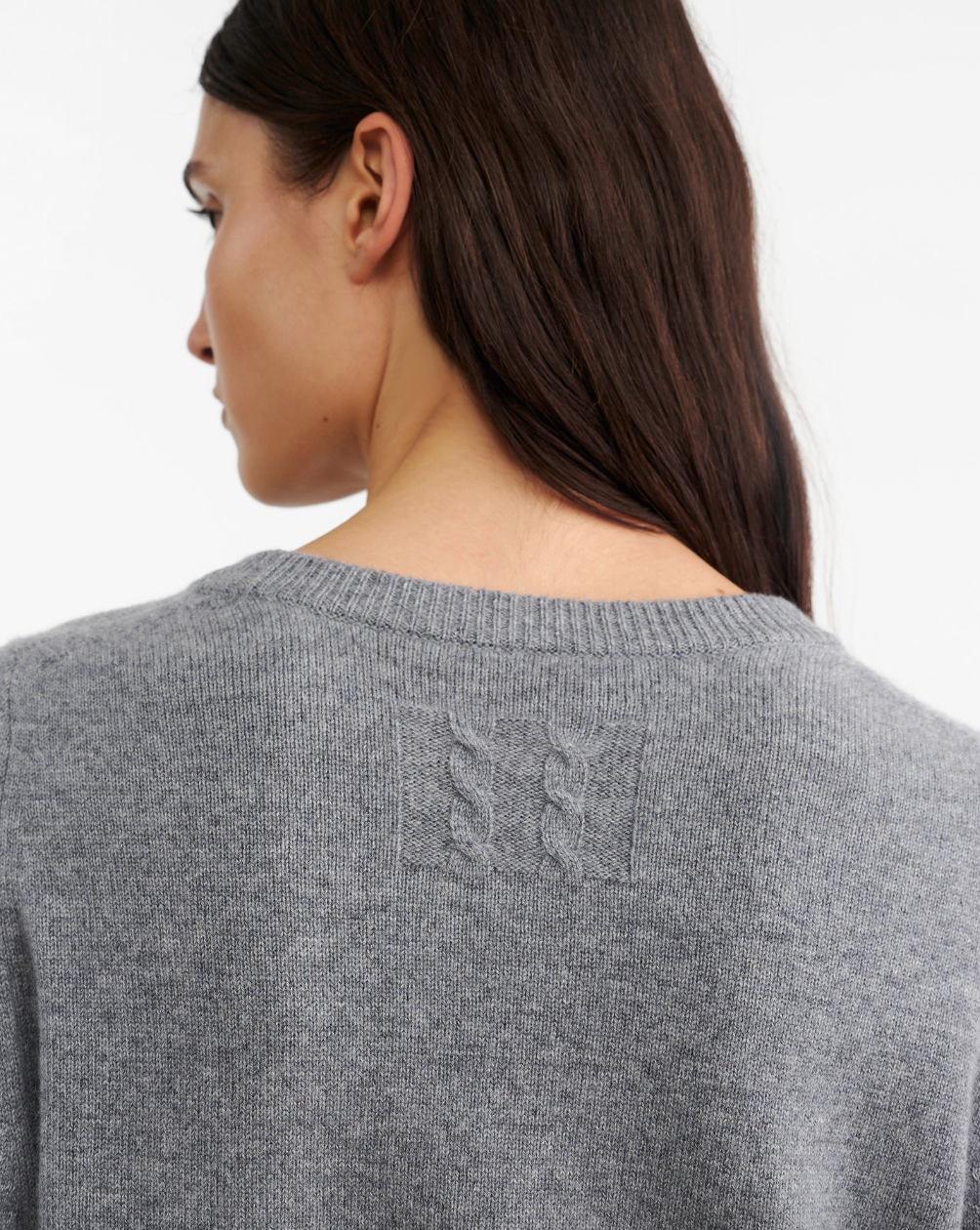 Person wearing Nora Cashmere Sweater in Medium Grey Melange