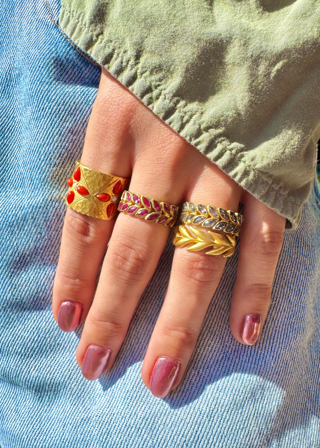Person wearing Cathy Waterman fine jewelry rings